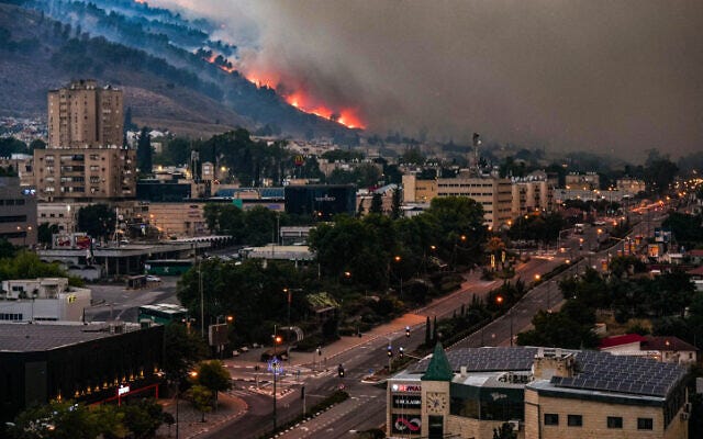 View of a large fire caused by rockets fired from Lebanon in the northern town of Kiryat Shmona, June 3, 2024 (Ayal Margolin/ Flash90) View of a large fire caused by rockets fired from Lebanon in the northern town of Kiryat Shmona, June 3, 2024 (Ayal Margolin/ Flash90)