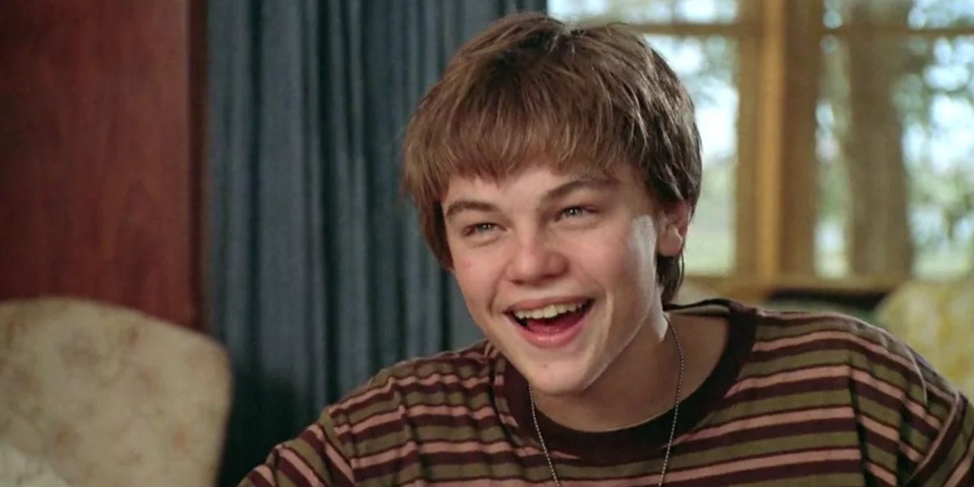 Arnie Grape (Leonardo DiCaprio) smiling and laughing in What's Eating Gilbert Grape (1993) Arnie Grape (Leonardo DiCaprio) smiling and laughing in What's Eating Gilbert Grape (1993)