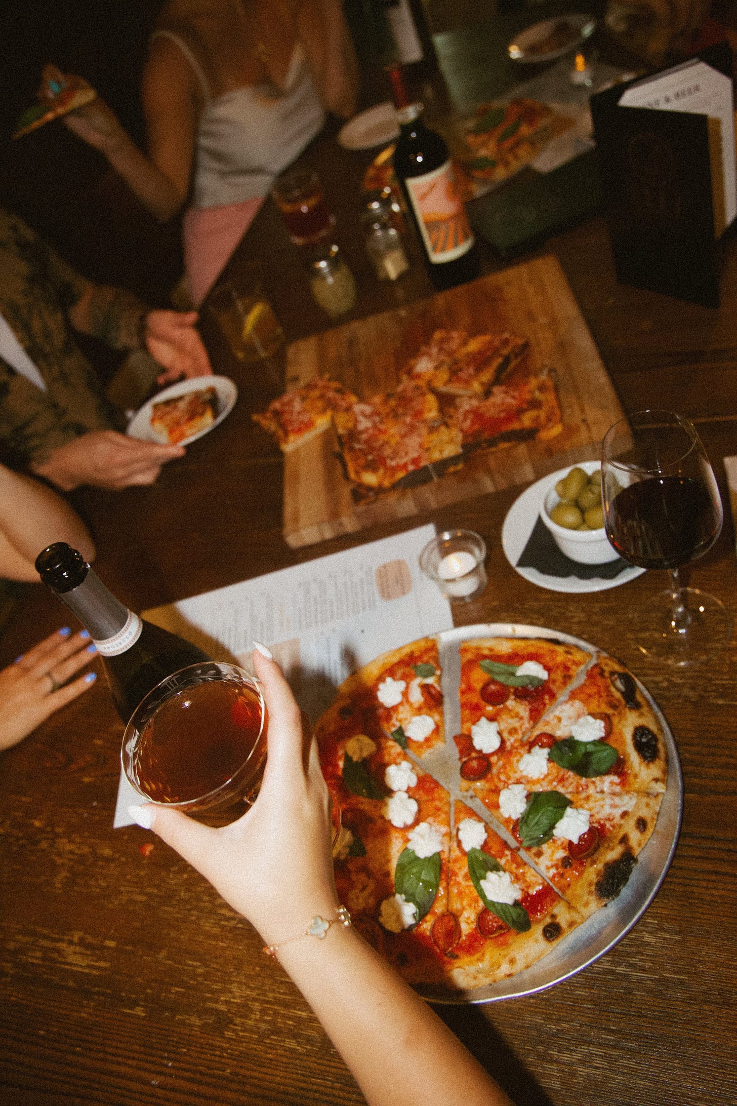 Itri wood fired pizza on a table