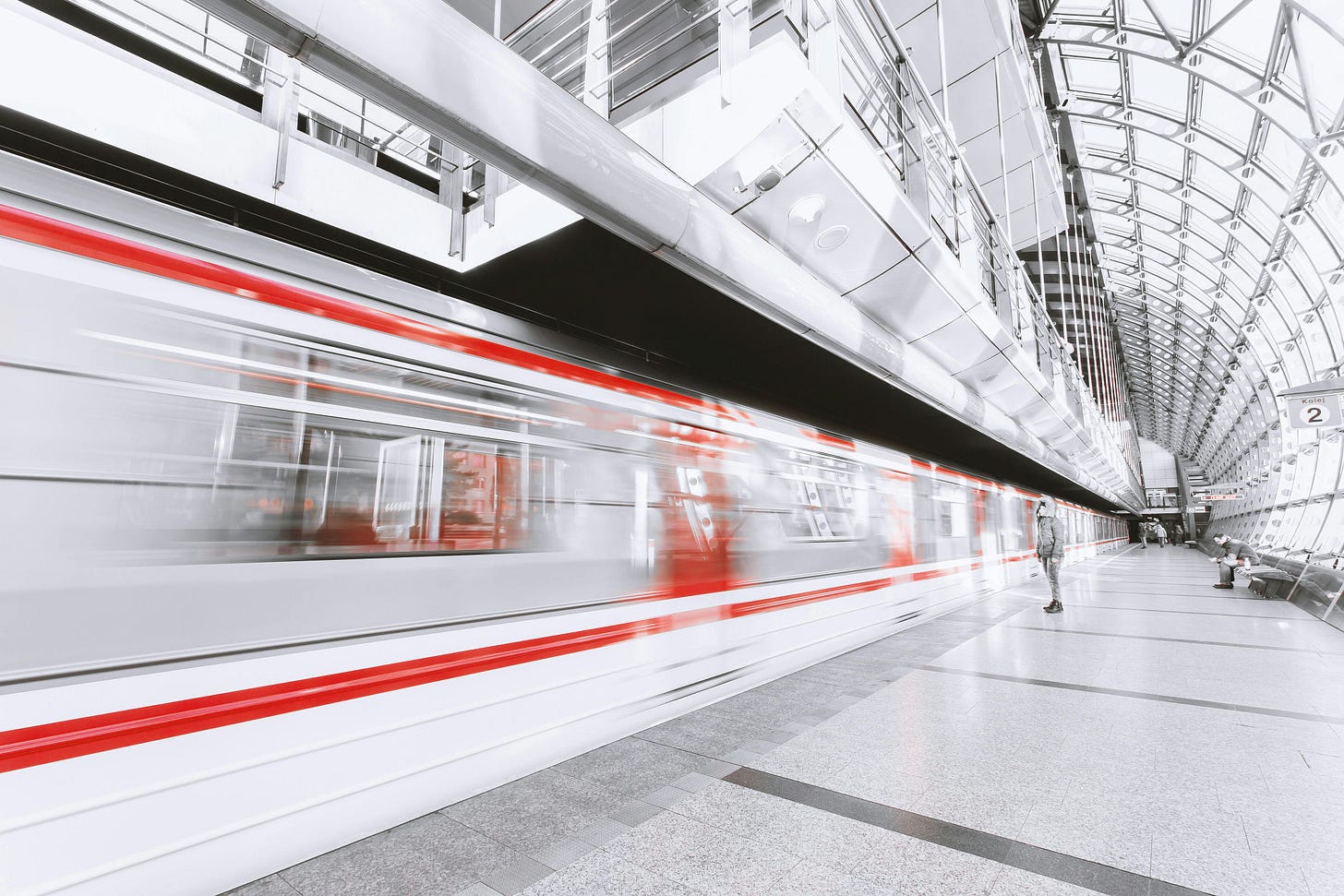Free Blurred Motion of Illuminated Railroad Station in City Stock Photo