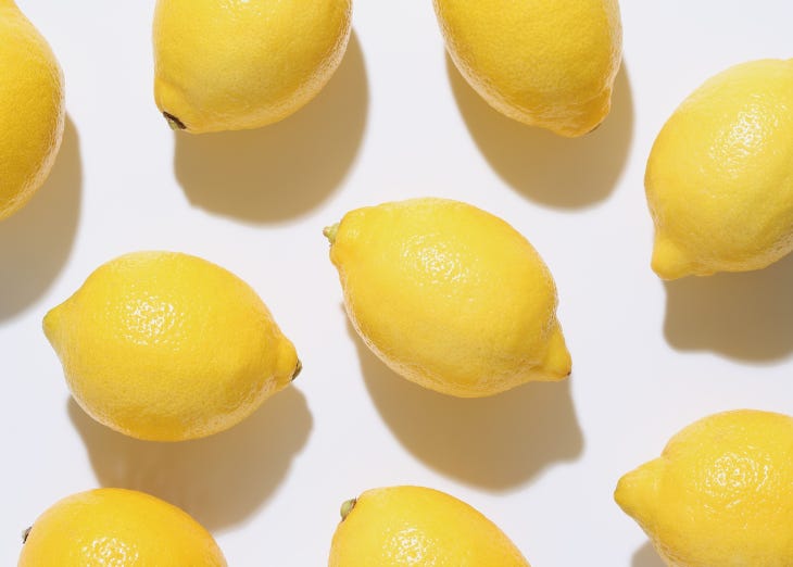 An assortment of lemons on a white background