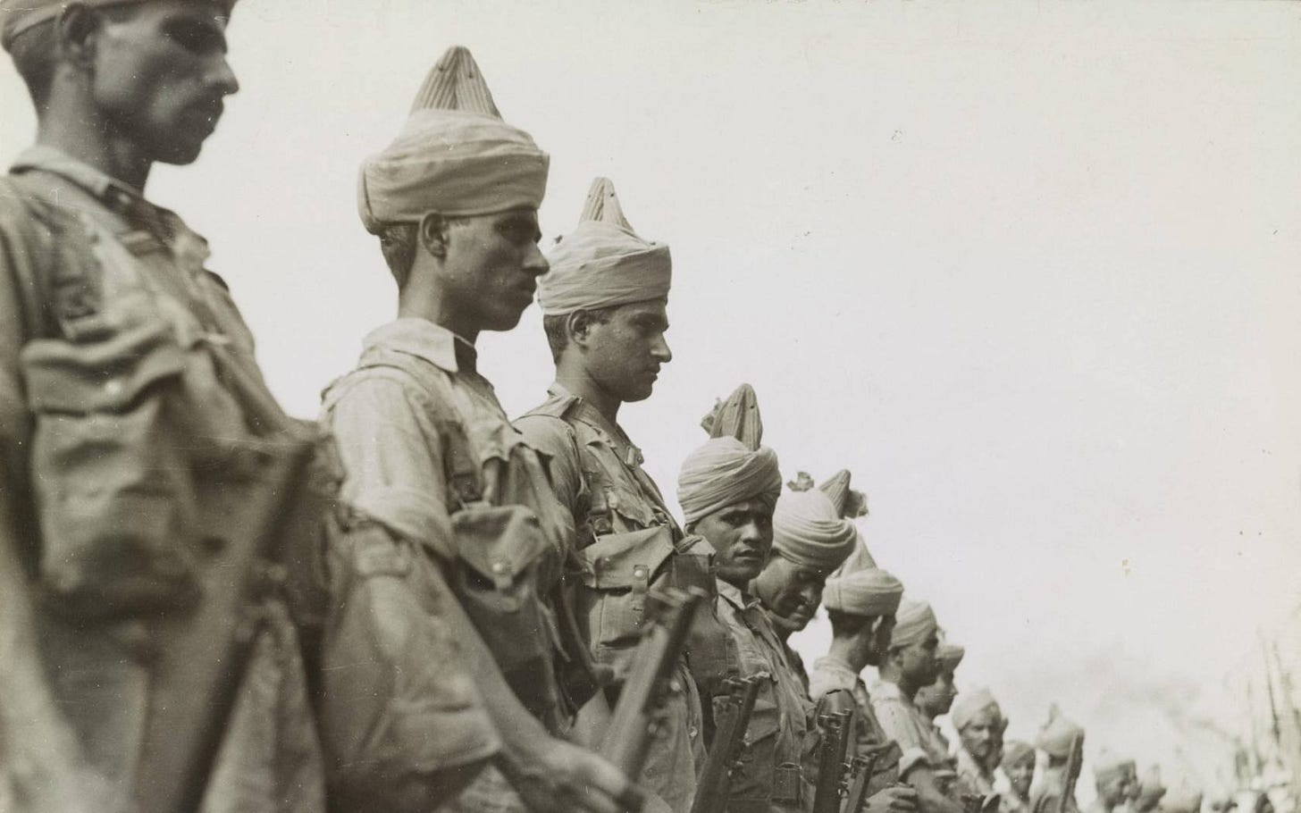 Newly arrived British Indian soldiers stand at attention prior to inspection at Singapore in December 1941.