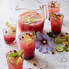 Hibiscus & Pomegranate Chapman with Herby Tamarind Lamb with Baked Jollof 
