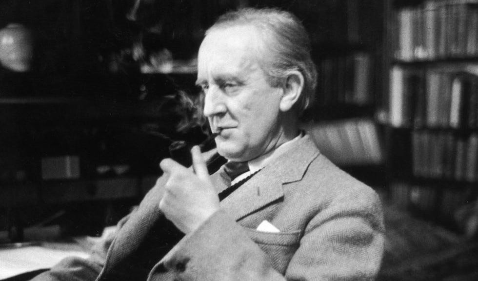 Writer JRR Tolkien smokes a pipe