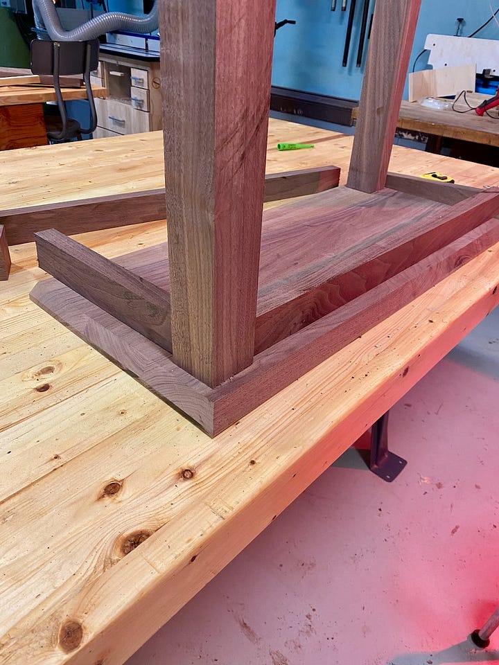 The seat runs through the drum sander to smooth and flatten. Then, upside down with beveled edges, I lay out the location of the base.