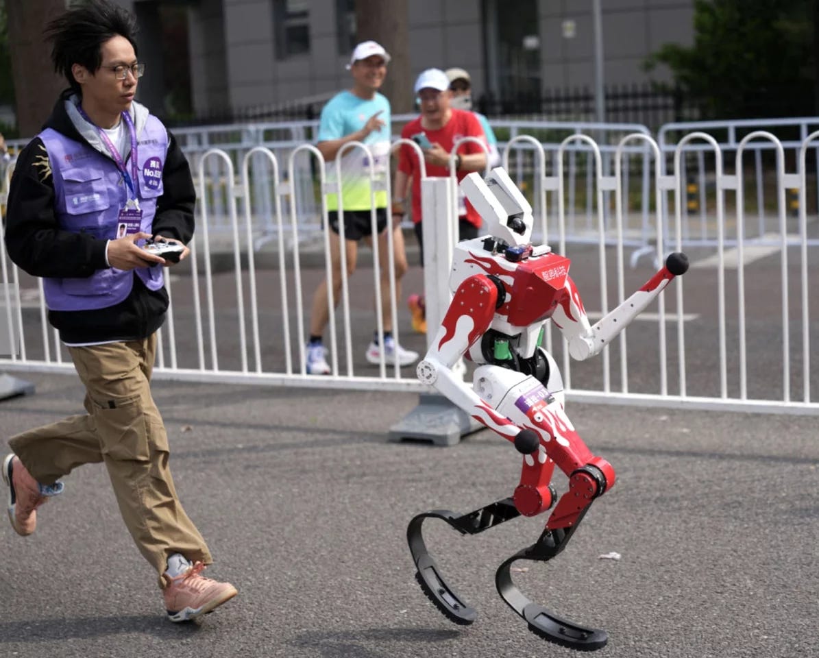 Team members with remote controls also had to run the distance behind their bots