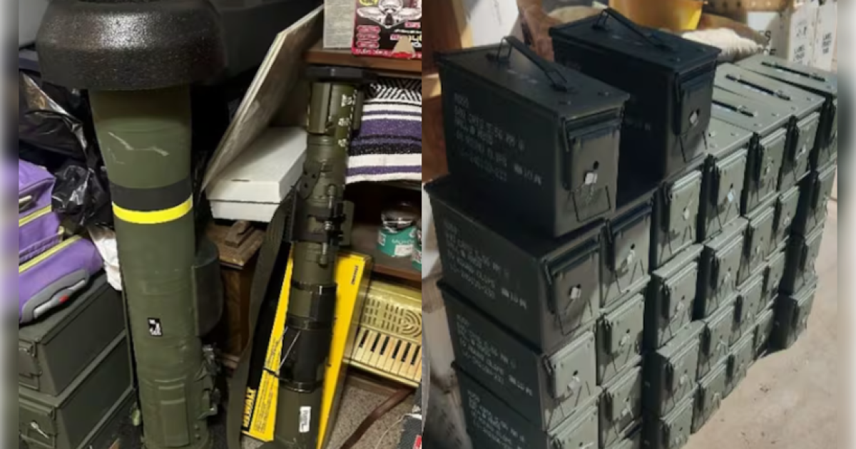 Image shows military-grade equipment, including a missile launcher and multiple ammunition boxes, stored in a cluttered space. Image shows military-grade equipment, including a missile launcher and multiple ammunition boxes, stored in a cluttered space.