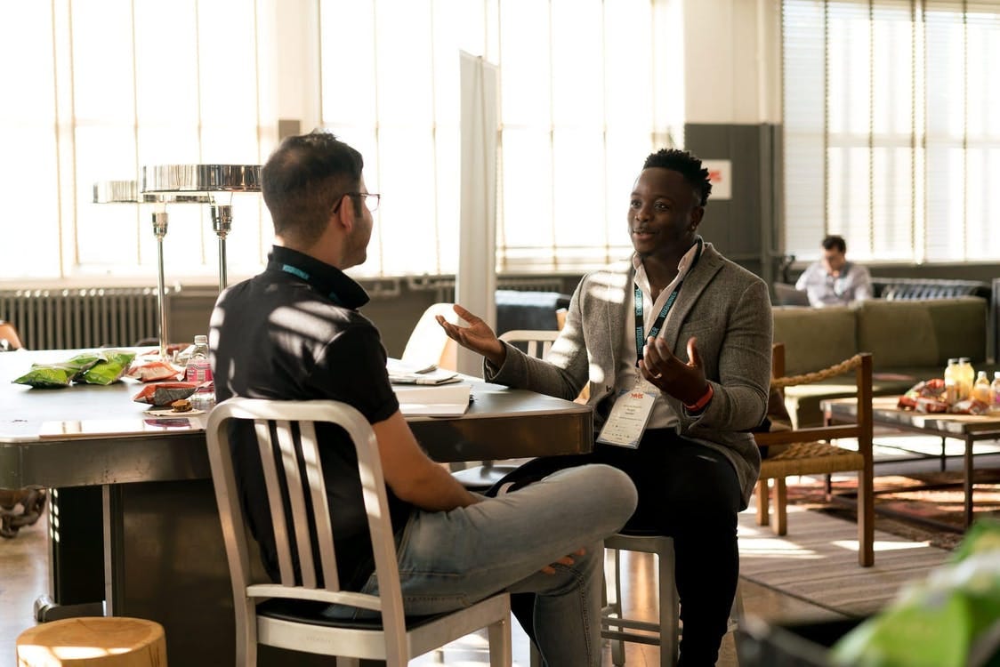 Photo of Men Having Conversation Photo of Men Having Conversation