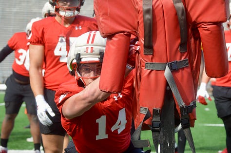 Wisconsin outside linebackers participate in individual position drills during the Badgers' spring football practice Saturday inside Camp Randall Stadium.