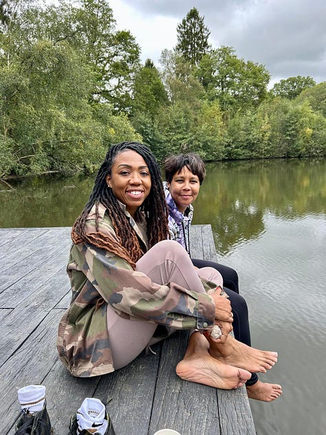 Women doing yoga, in the woods and in a lake