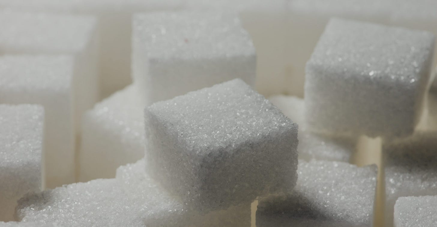 a pile of sugar cubes sitting on top of each other