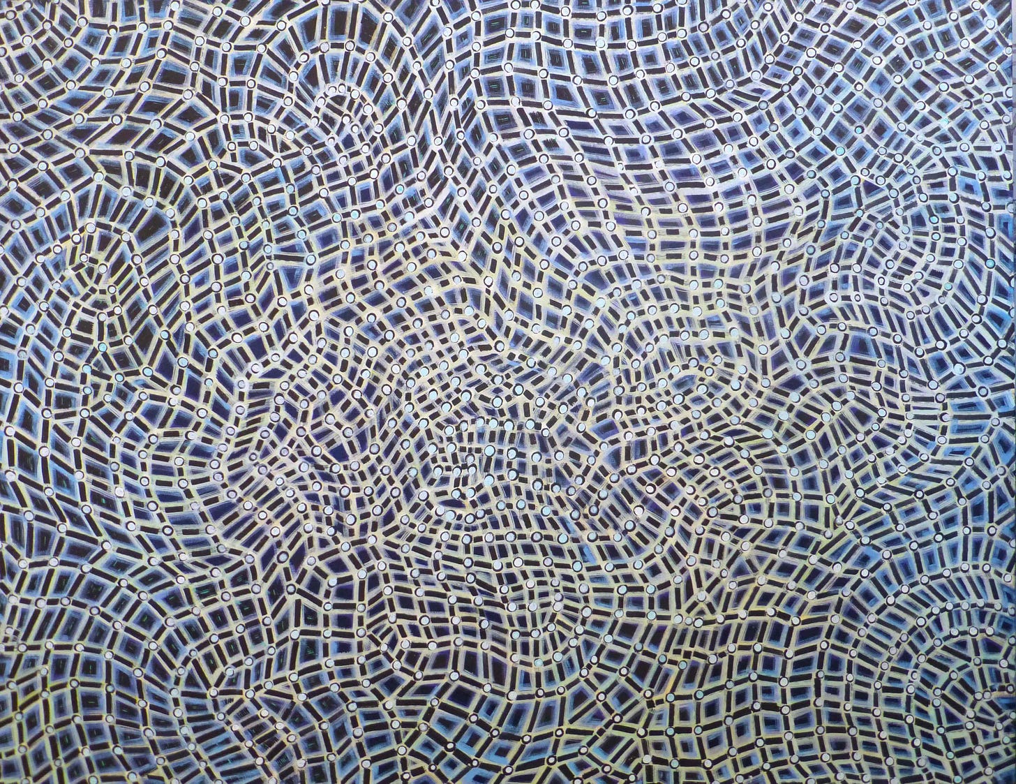 A kind of dizzying spread of blue "netting" on a black background, almost kaleidoscopic. 