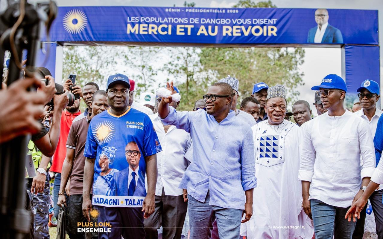 May be an image of one or more people and text that says "Co BENIN PRESIDENTIELLE 2026 LES POPULATIONS DE DE DANGBO VOUS DISENT MERCI ET AU REVOIR NBA W26 PLUS LOIN, ENSEMBLE 進 WADAGNI TALAT PLUSLOIN PLUS LOIN, ENSEMBLE www.wadagni.bj"