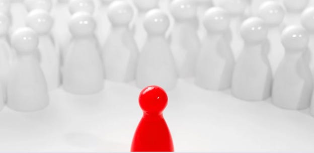 A red game piece in front of white figures
AI-generated content may be incorrect. A red game piece in front of white figures
AI-generated content may be incorrect.