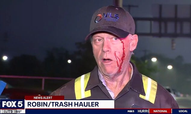 The trash hauler, known only as Robin, said striking dock workers attacked his vehicle as he tried to enter the port The trash hauler, known only as Robin, said striking dock workers attacked his vehicle as he tried to enter the port