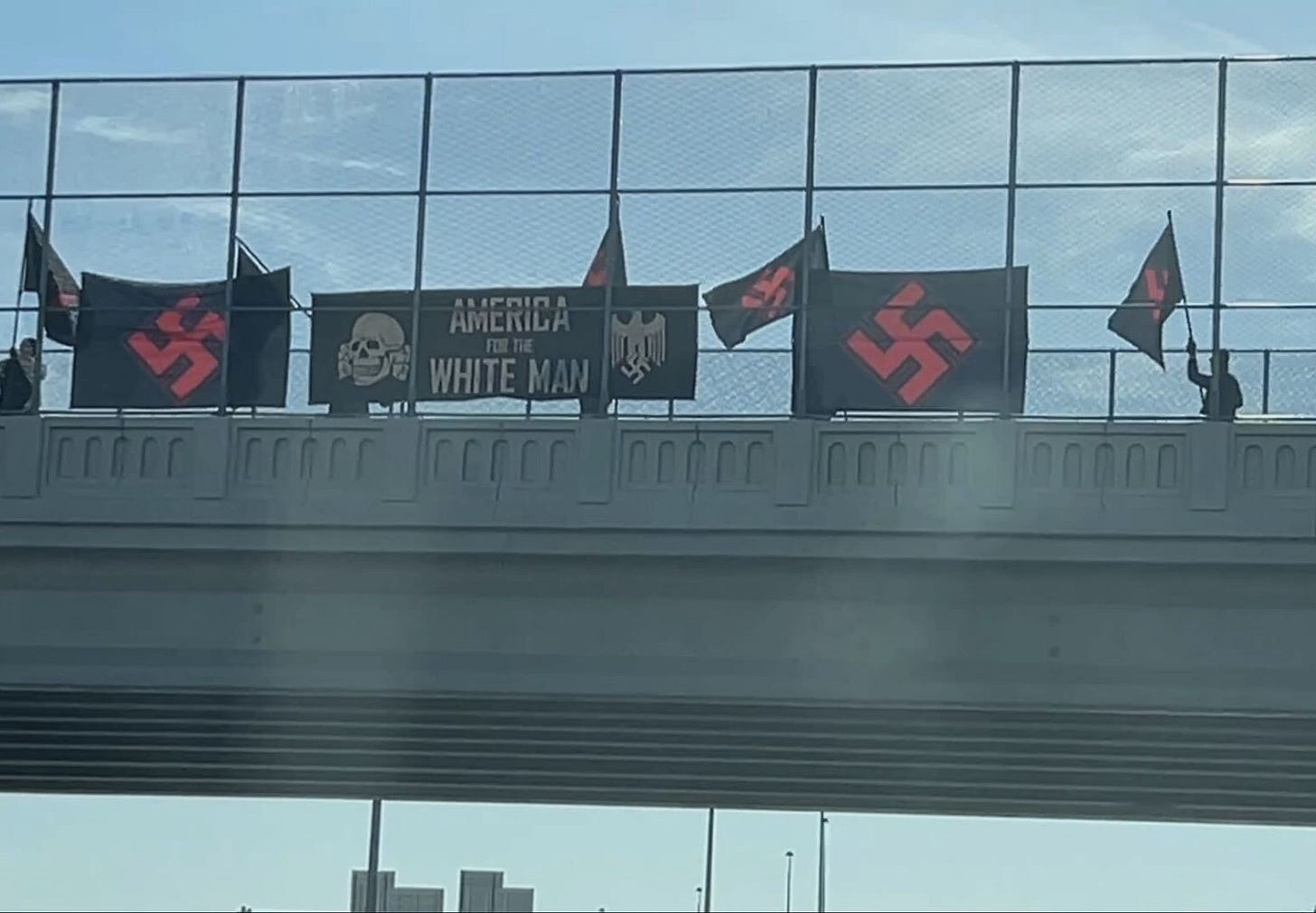 With the purpose of intimidation': Multiple calls for legal action after neo -Nazi rally