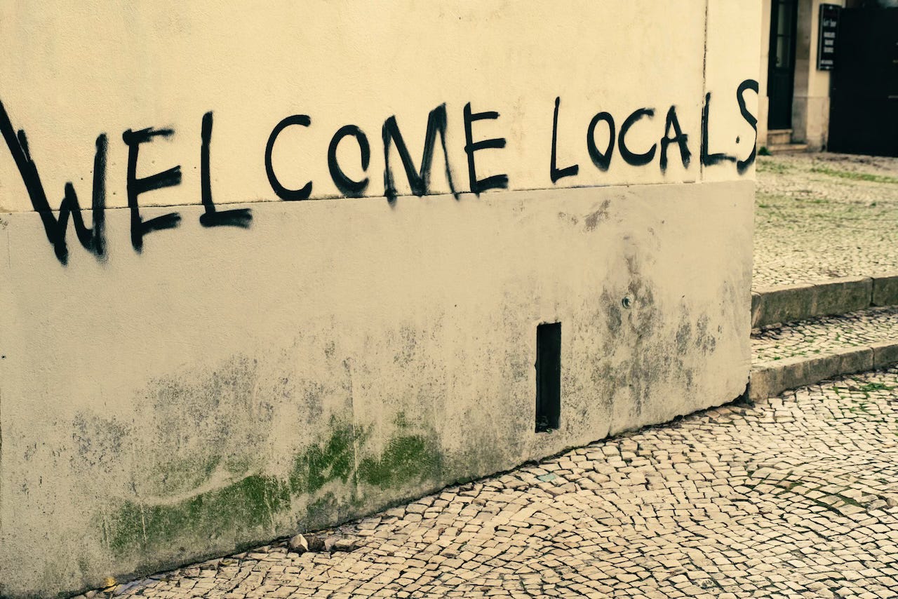 Words on walls: welcome locals