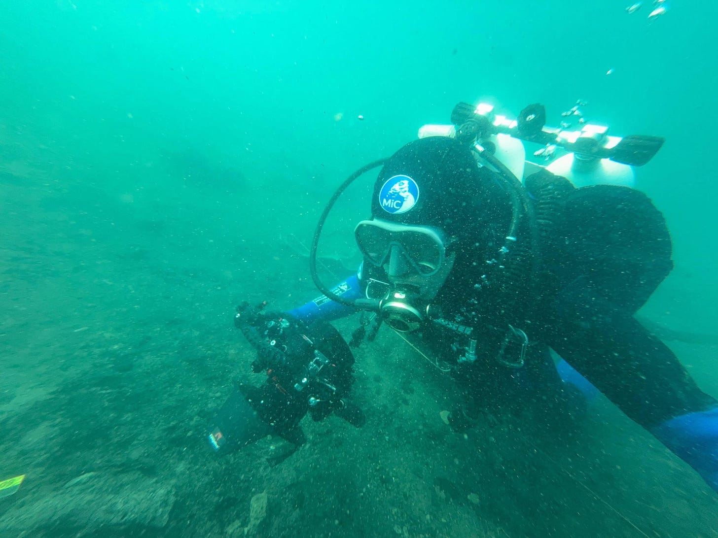 A diver from Italy's Underwater Archaeology Service at work on the lakebed of Lake Bolsena, at the submerged site of Gran Carro. Photo Soprintendenza Archeologia Belle Arti Paesaggio Etruria Meridionale. A diver from Italy's Underwater Archaeology Service at work on the lakebed of Lake Bolsena, at the submerged site of Gran Carro. Photo Soprintendenza Archeologia Belle Arti Paesaggio Etruria Meridionale.