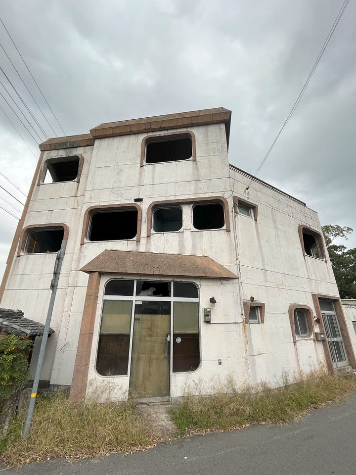 Various scenes of the Japanese countryside including fig trees, old signposts, rice stooks and abandoned buildings