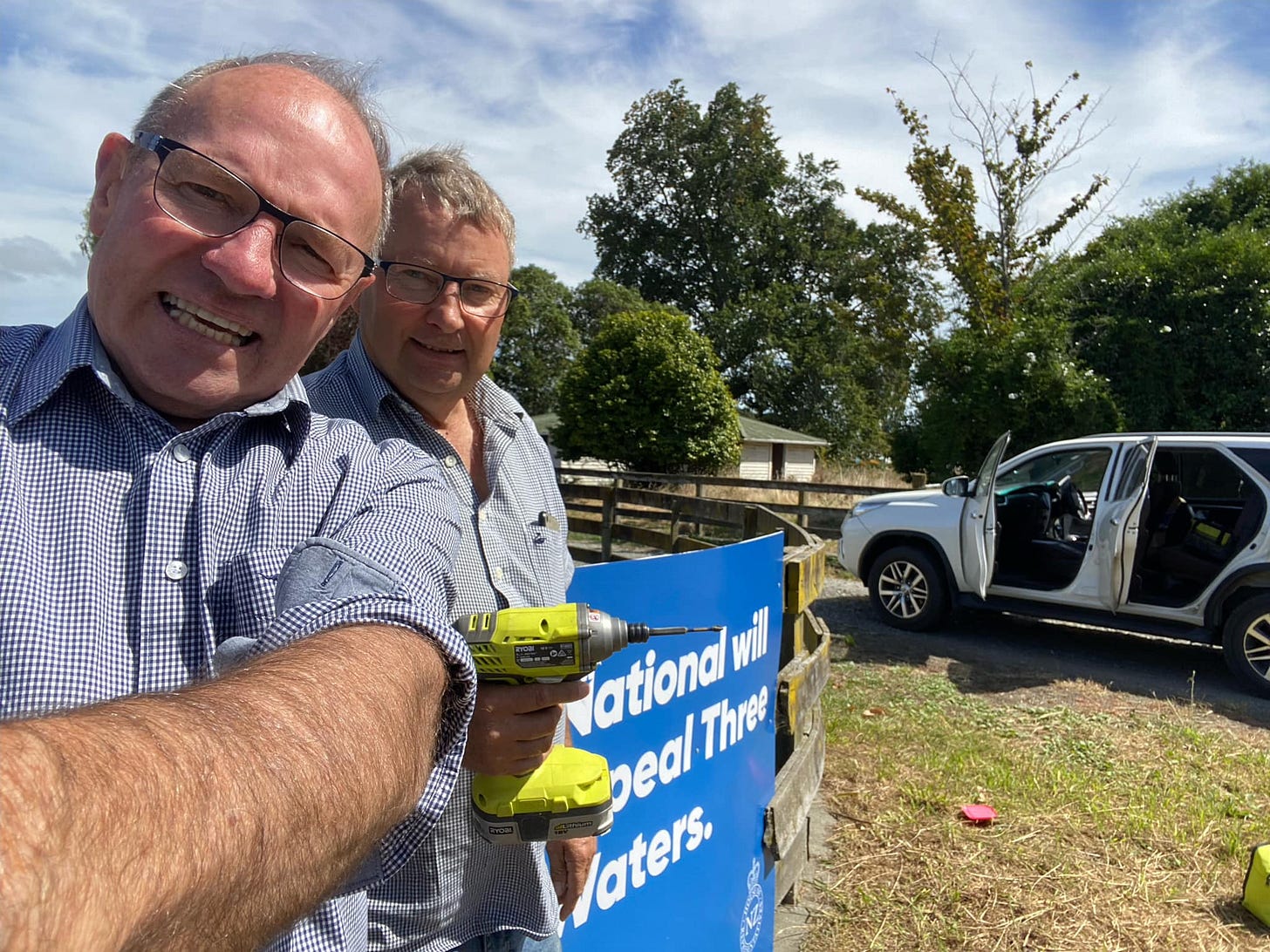 National MP, Ian McKelvie and Grant Hadfield erect anti-Three Waters signs for the National Party. National MP, Ian McKelvie and Grant Hadfield erect anti-Three Waters signs for the National Party.