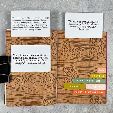 creative art journal pages in a small notebook