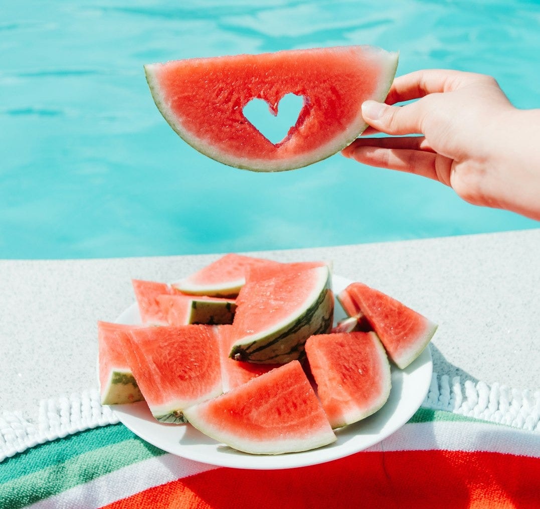 sliced watermelon on white paper