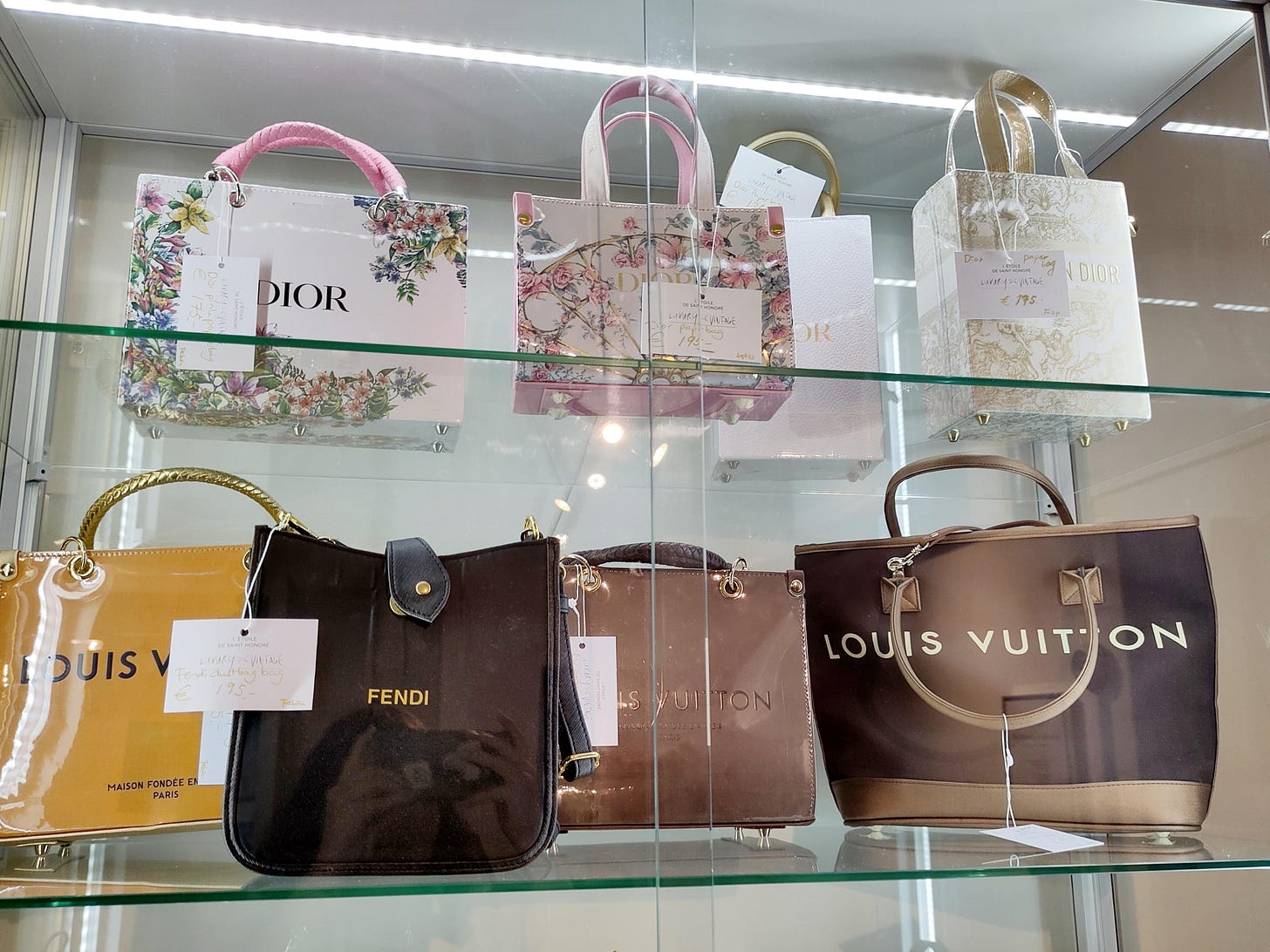 Found these in a vintage designer store, purses made from reused ...