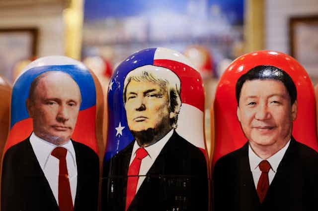 Matryoska dolls featuring images of Vladimir Putin, Donald Trump and Xi Jinping.