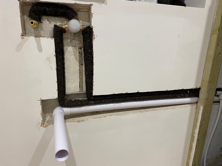 pipework installed and connected into the wall