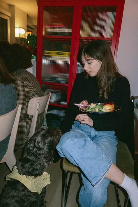 A gallery of three photographs: one of a bouquet of radishes in a jar, one of a woman eating a plate of seasonal food, and the third a closeup of the food on her place
