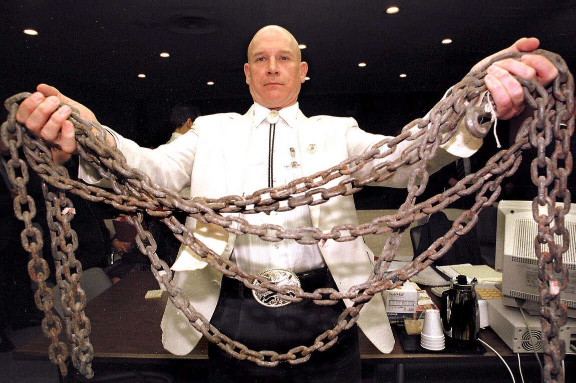 Jasper County Assistant District Attorney Pat Hardy displays the chain used by three white men, two of whom were known Neo-Nazis, to drag James Byrd Jr., a black man, to his death. The lynching of Byrd remains one of the most infamous hate crimes in modern American history, Texas, 1999 Jasper County Assistant District Attorney Pat Hardy displays the chain used by three white men, two of whom were known Neo-Nazis, to drag James Byrd Jr., a black man, to his death. The lynching of Byrd remains one of the most infamous hate crimes in modern American history, Texas, 1999