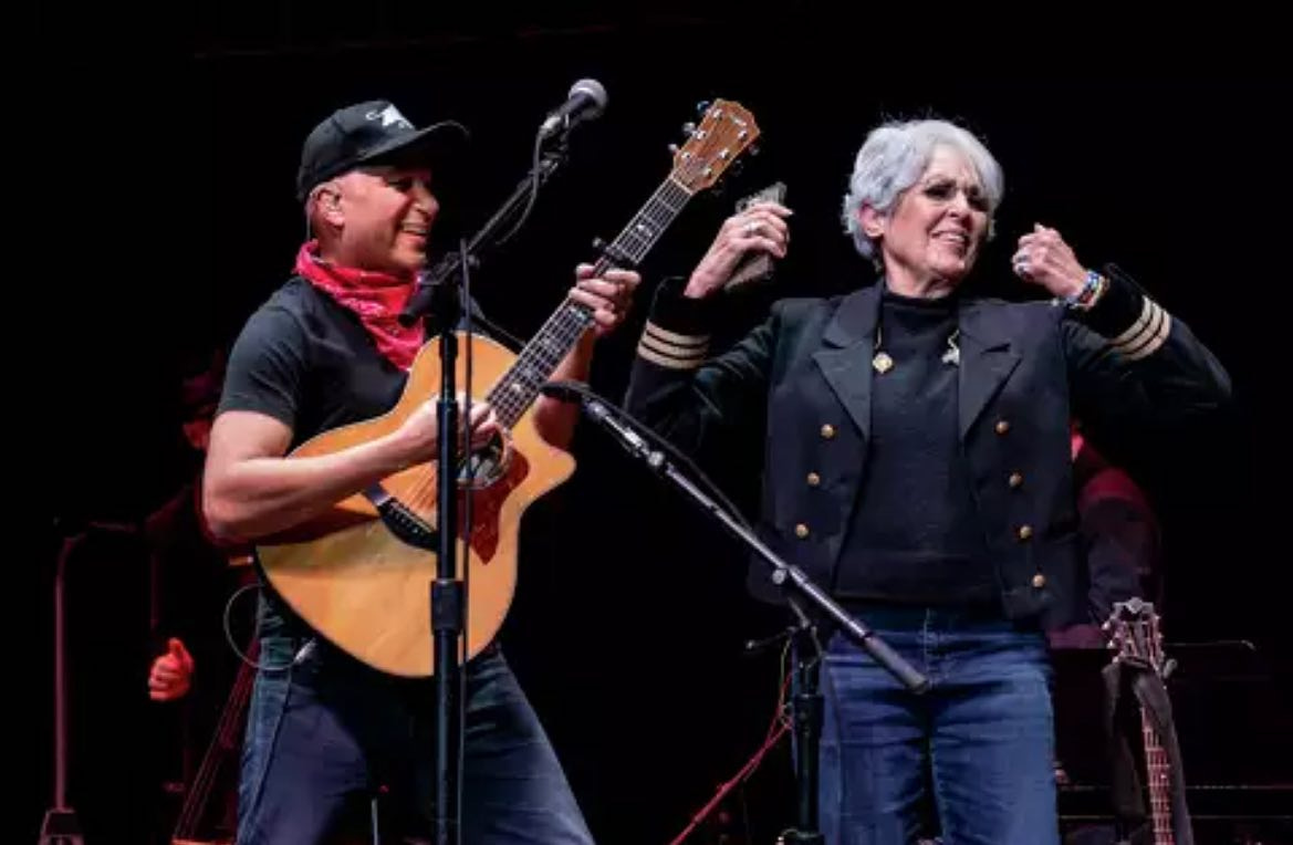 May be an image of 2 people, guitar and accordion
