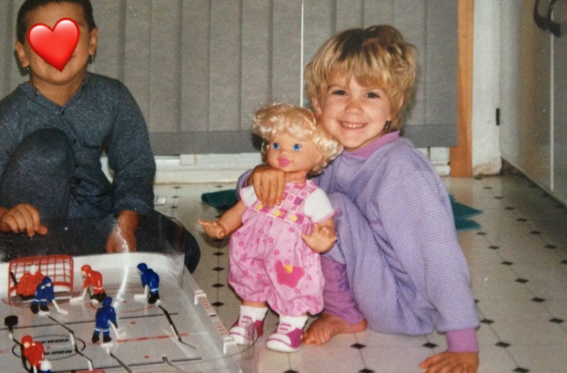 Brooklyn as a child with her doll Brooklyn as a child with her doll