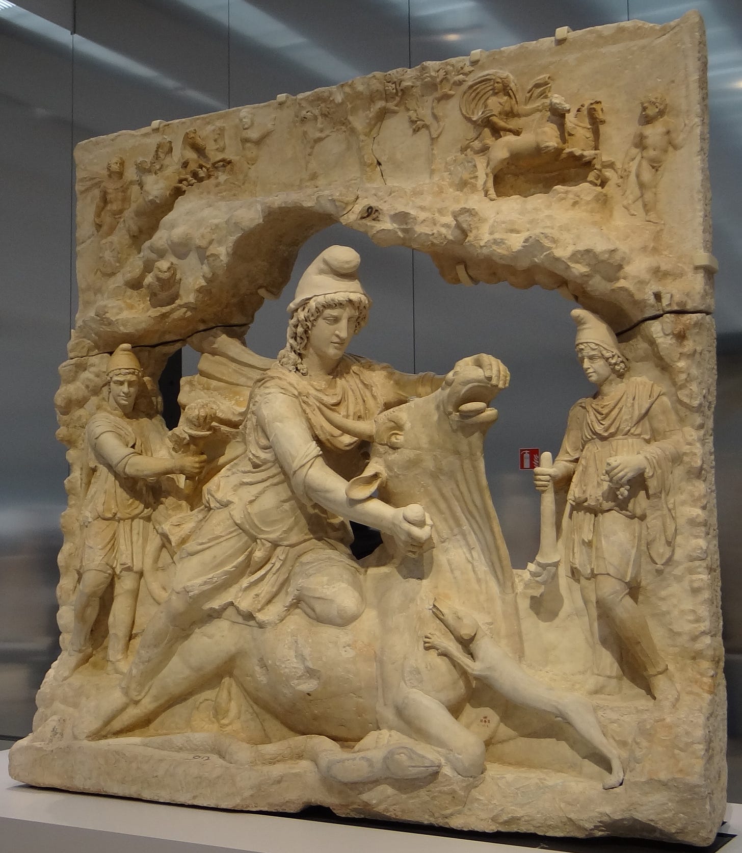 Persian Mithra in its Roman avatar taken from https://en.wikipedia.org/wiki/Mithraism#/media/File:Mithra_sacrifiant_le_Taureau-005.JPG