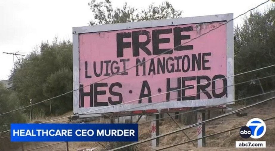 Billboard says free Luigi Mangione. He’s a hero 