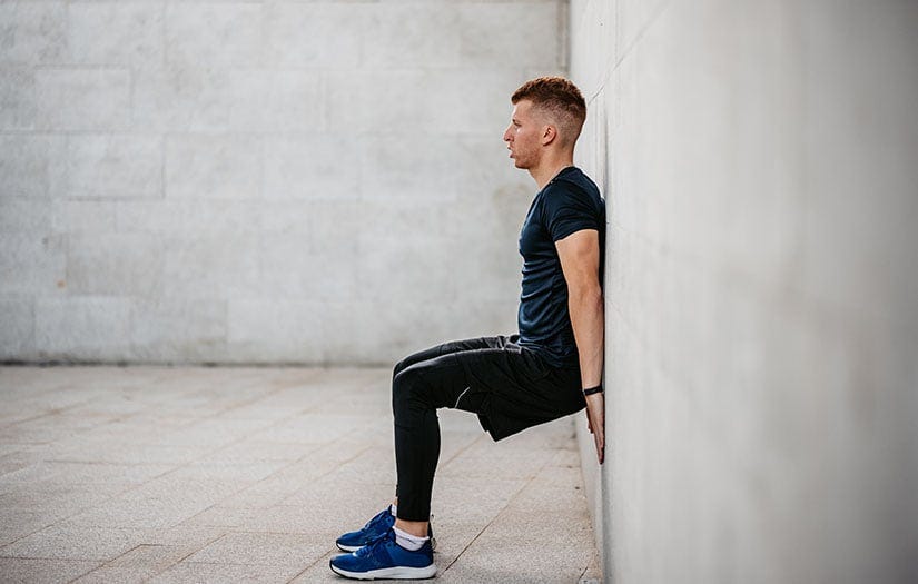 Wall Sits: Helpful Tips and Benefits - NASM Wall Sits: Helpful Tips and Benefits - NASM