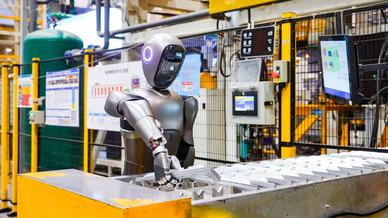 A humanoid robot working on an assembly line at the Midea production center in Jingzhou, China.
