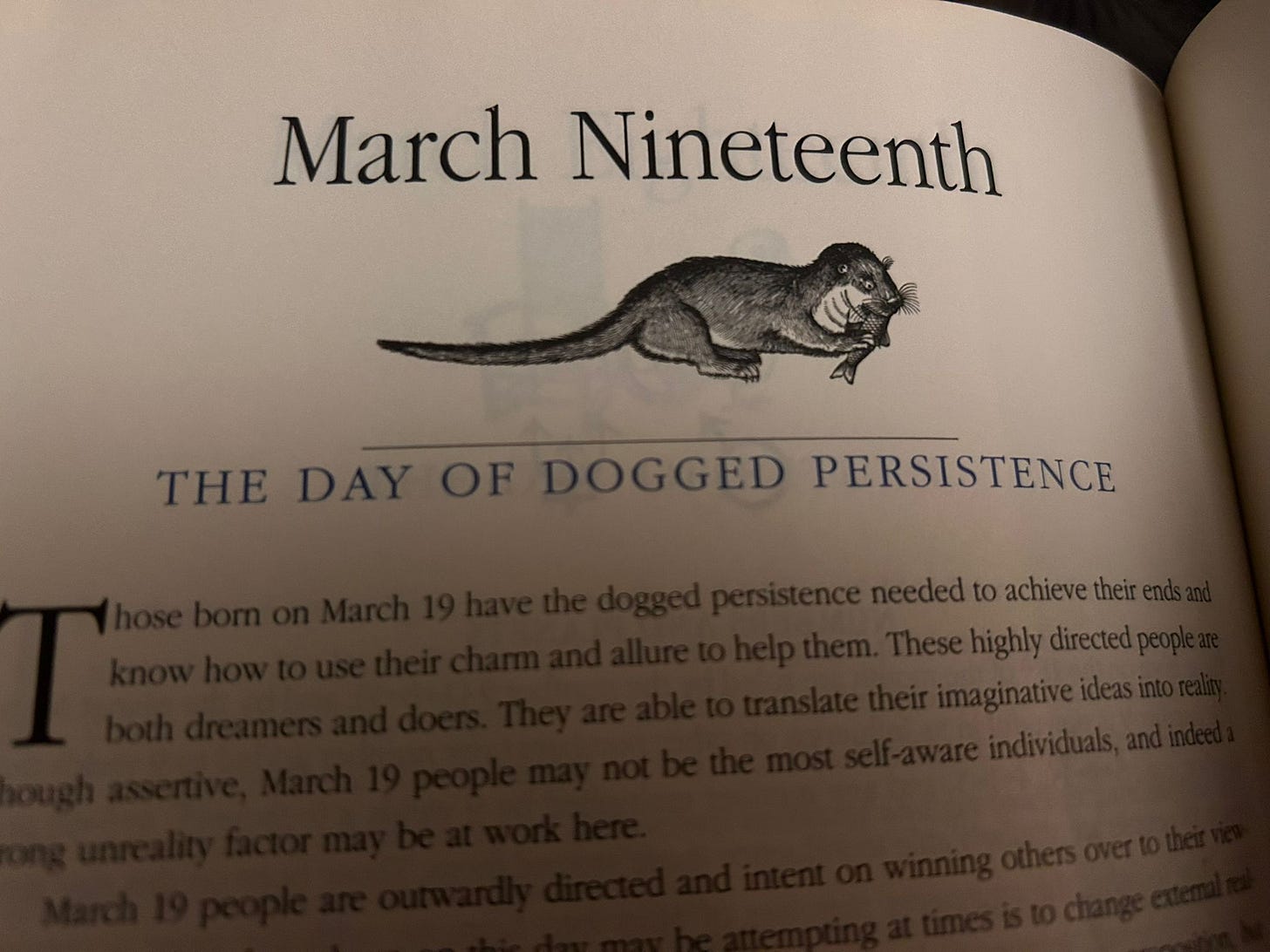 Interior page from The Secret Language of Birthdays showing March 19 entry titled The Day of Dogged Persistence with illustrated otter - personality profile linked to tarot symbolism. Interior page from The Secret Language of Birthdays showing March 19 entry titled The Day of Dogged Persistence with illustrated otter - personality profile linked to tarot symbolism.