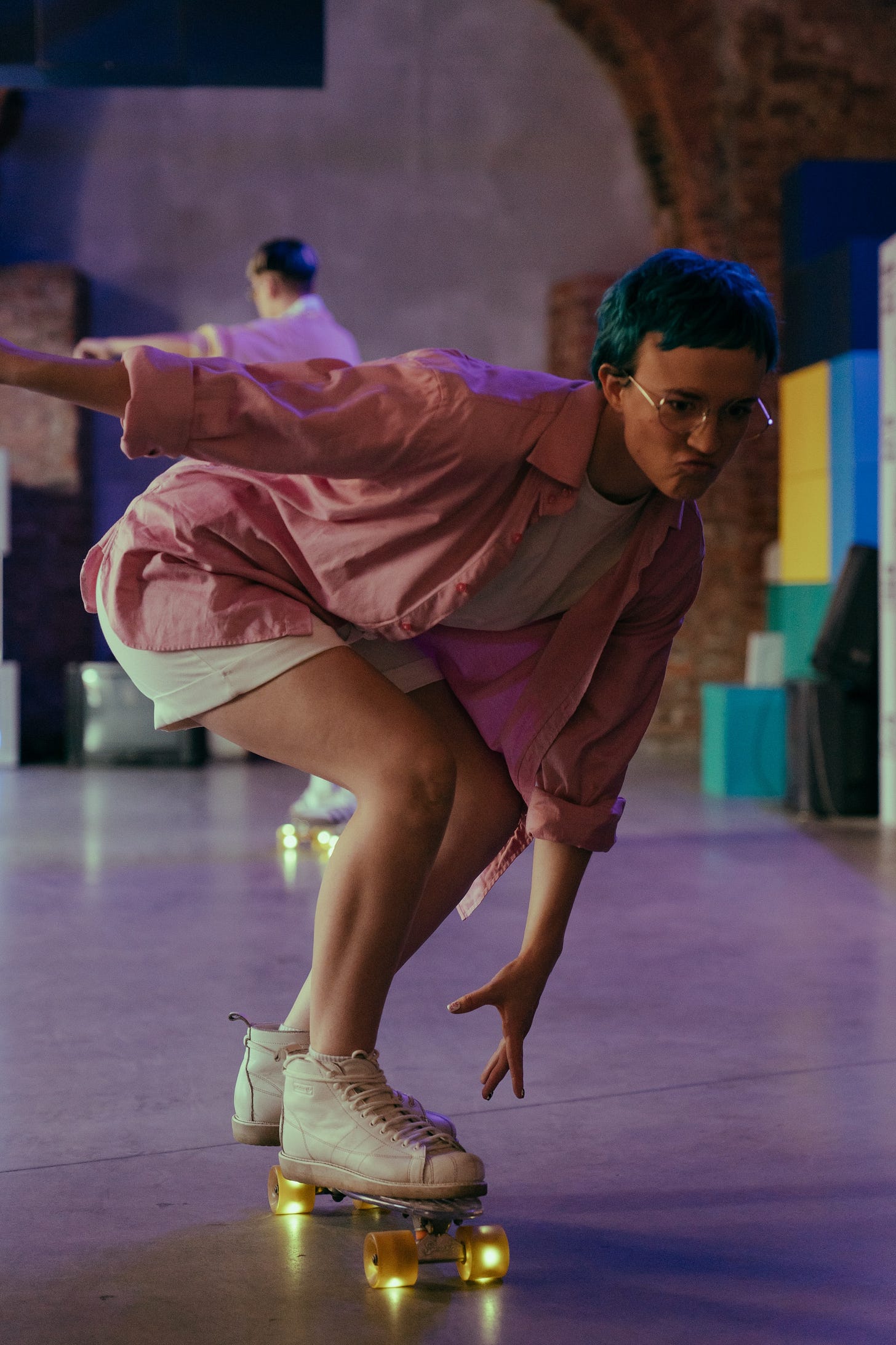 A young woman in roller skates.