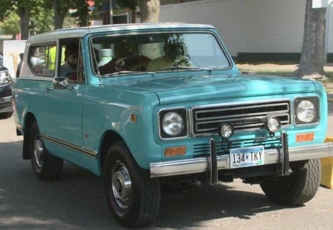 Color photo of a carefully restored 1979 International Scout with turquoise body and white roof Color photo of a carefully restored 1979 International Scout with turquoise body and white roof