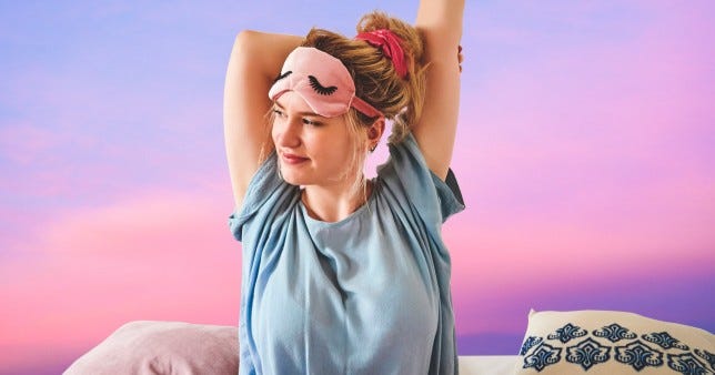 women waking up in bed