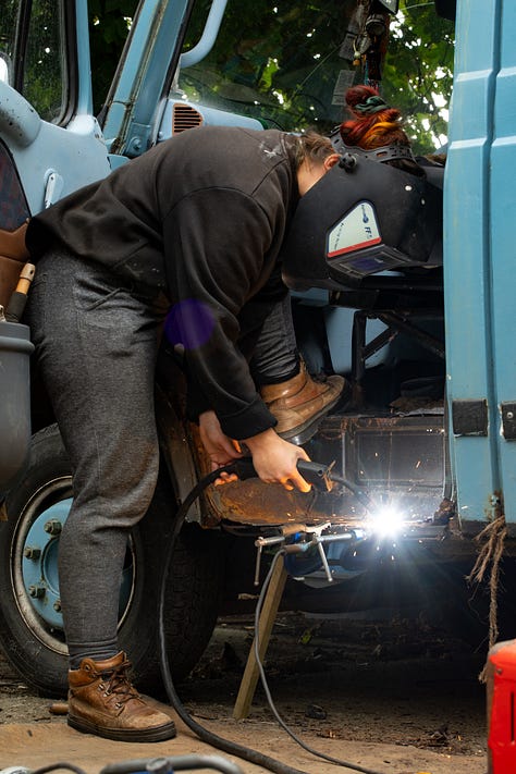 female girl woman mechanic petrol head growing up story travel writer van life welding repair spanners bodge fix LDV Convoy British vehicles old 