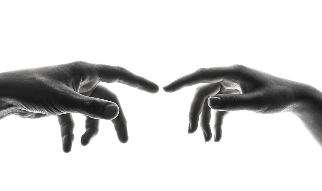 two person's connecting fingers two person's connecting fingers
