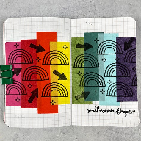 creative art journal pages in a small notebook