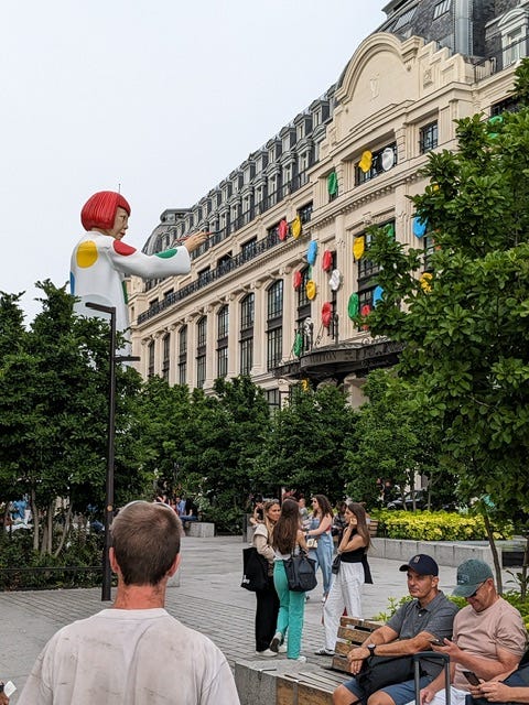 Statue of Kusama outside YSL, Paris