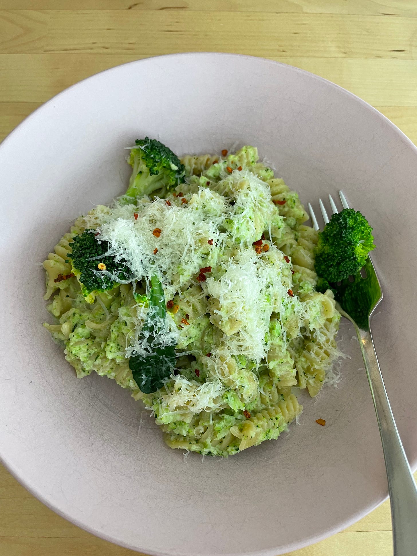 Spiral pasta, broccoli florets, parmesan and feta spiral pasta.