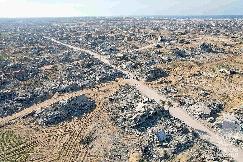 aerial view of destruction in Rafah following ceasefire; flattened buildings and rubble aerial view of destruction in Rafah following ceasefire; flattened buildings and rubble