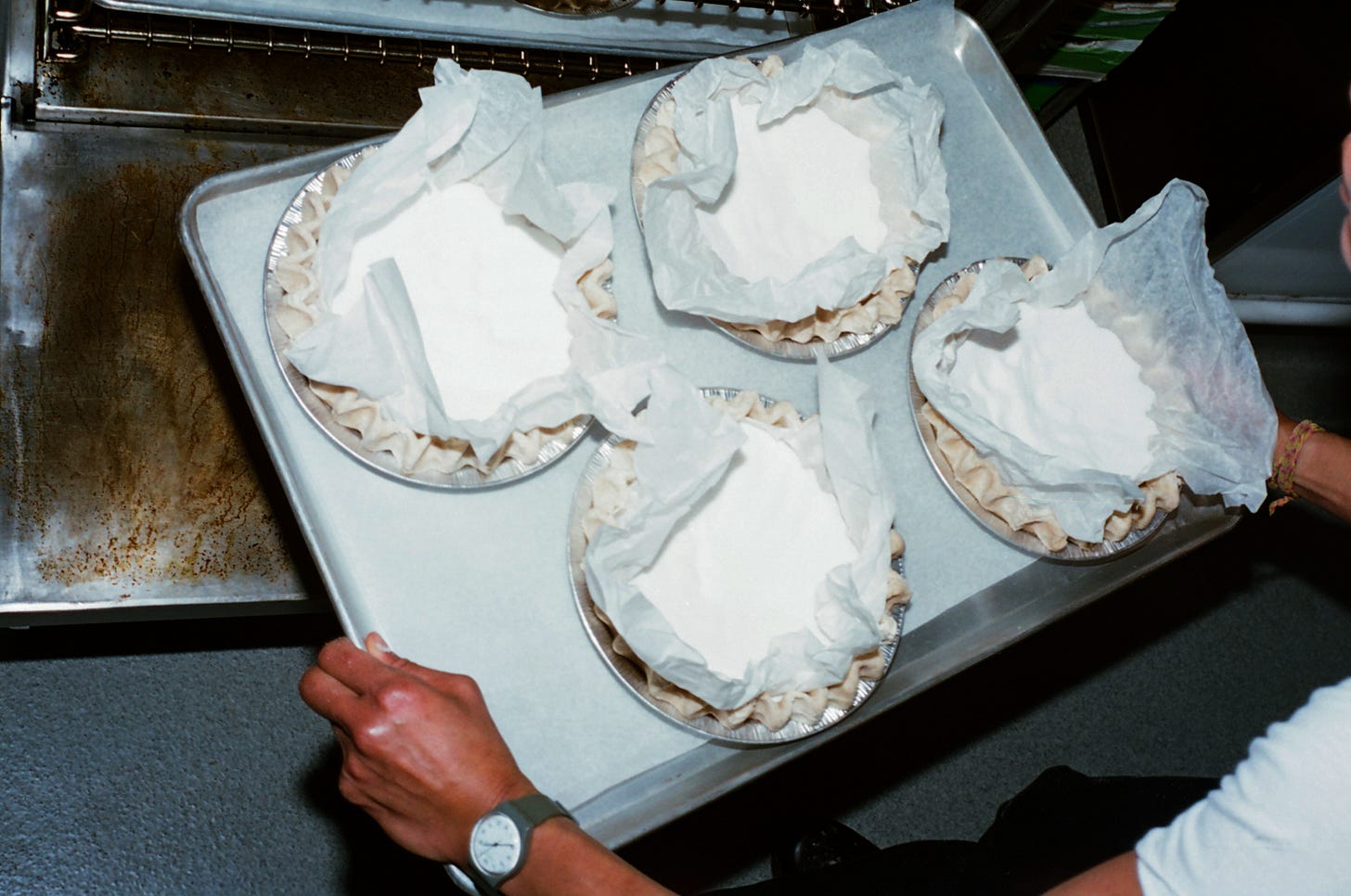 Chan blind-bakes pumpkin pie doughs