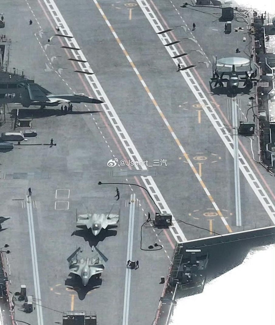 Mockups of CATOBAR J-15T and J-35 aircraft as well as a CATOBAR KJ-600 AEW&C Aircraft on Fujian's flight deck Mockups of CATOBAR J-15T and J-35 aircraft as well as a CATOBAR KJ-600 AEW&C Aircraft on Fujian's flight deck