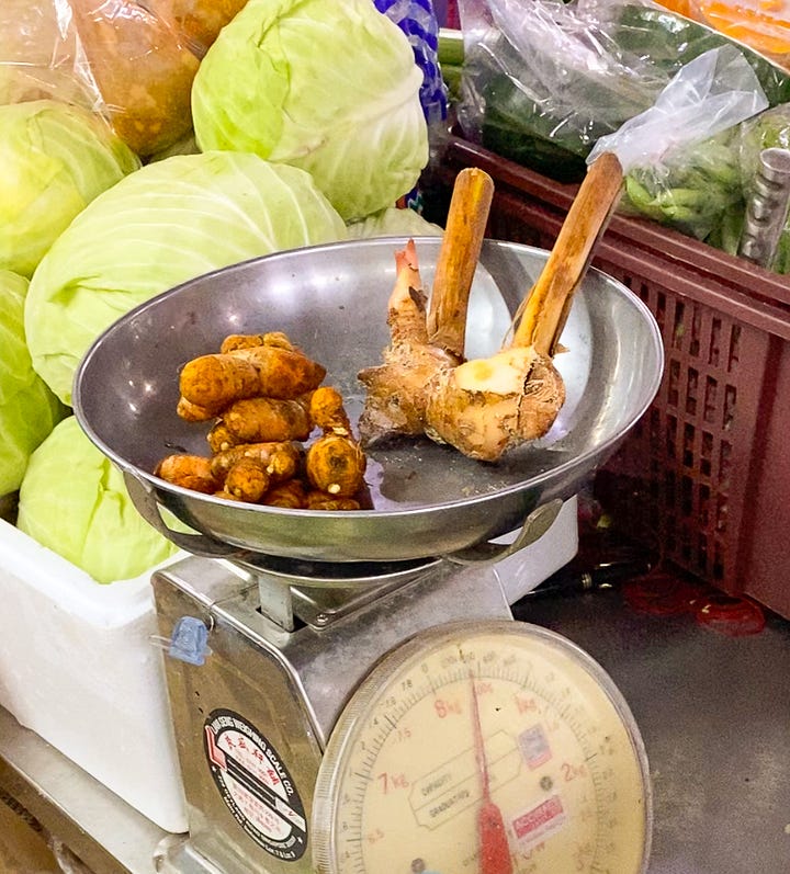 galangal and turmeric at the market